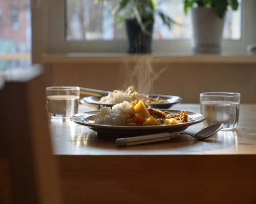 water and simple food on a table